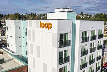 The top of a building with the logo on it